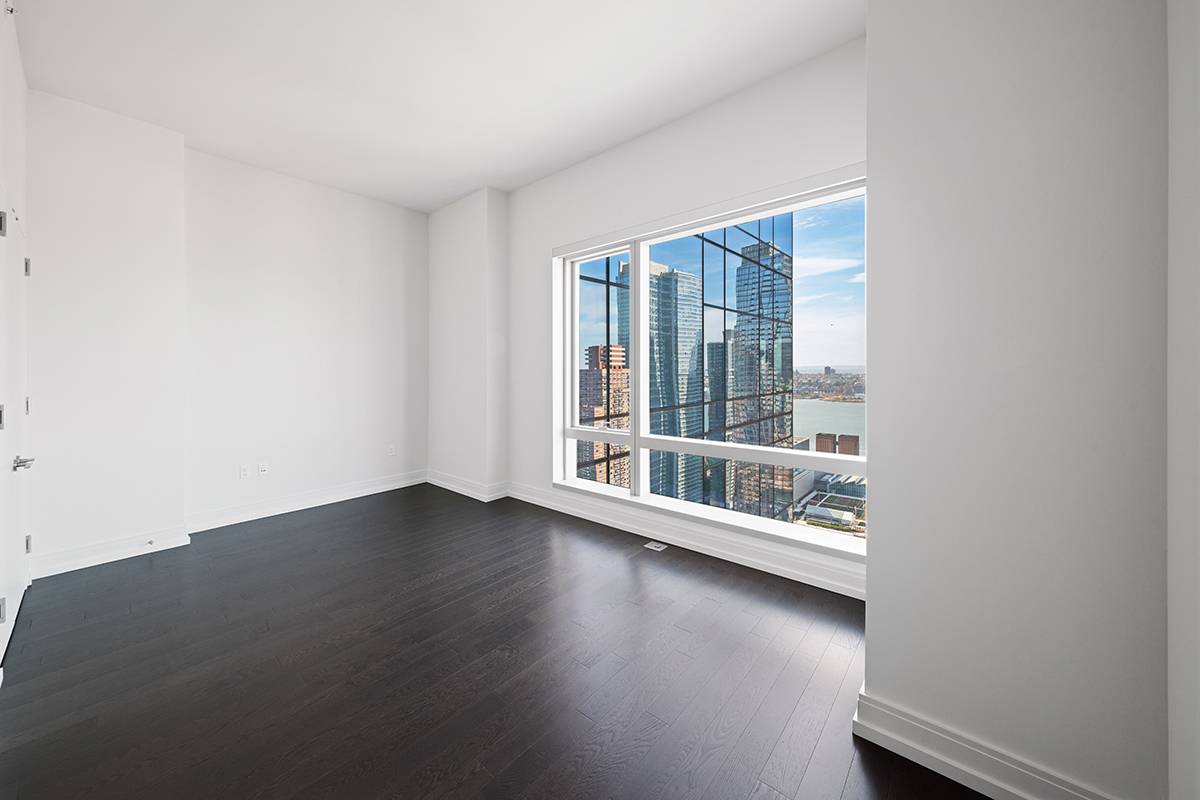 With sweeping views of the city from sunrise to sunset 555TEN towers over the new West Side.