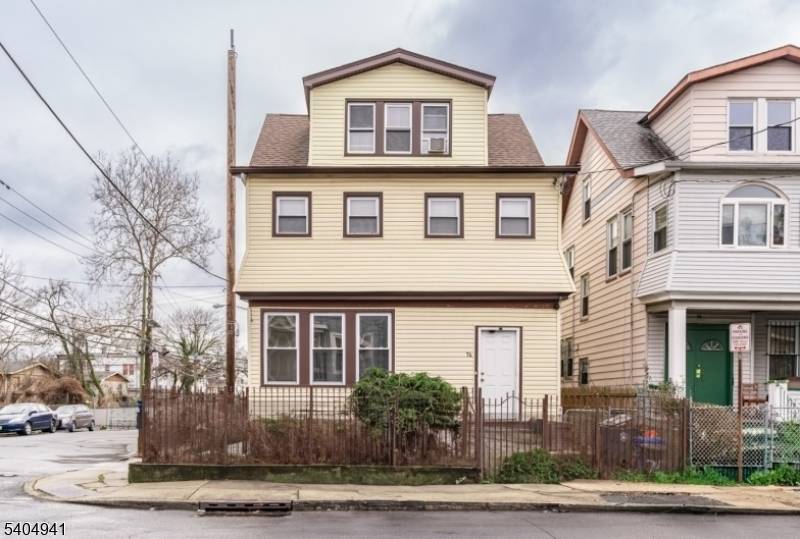 Well maintained two family property featuring two separate apartments, each offering 3 bedrooms and 1 full bathroom with spacious layouts.