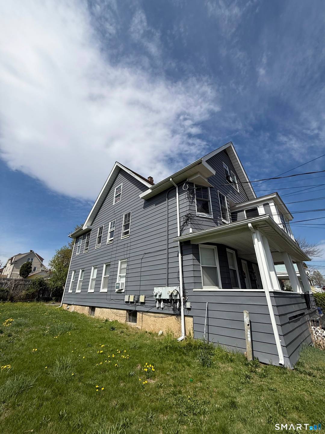 Renovated three family property offering strong income potential or ideal owner occupied living.