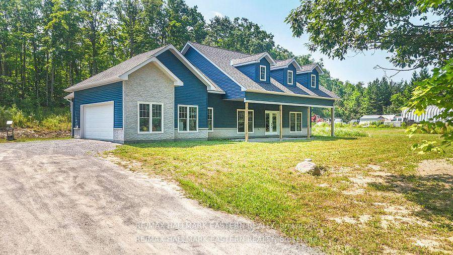 Custom Built Country Retreat on Nearly an Acre.