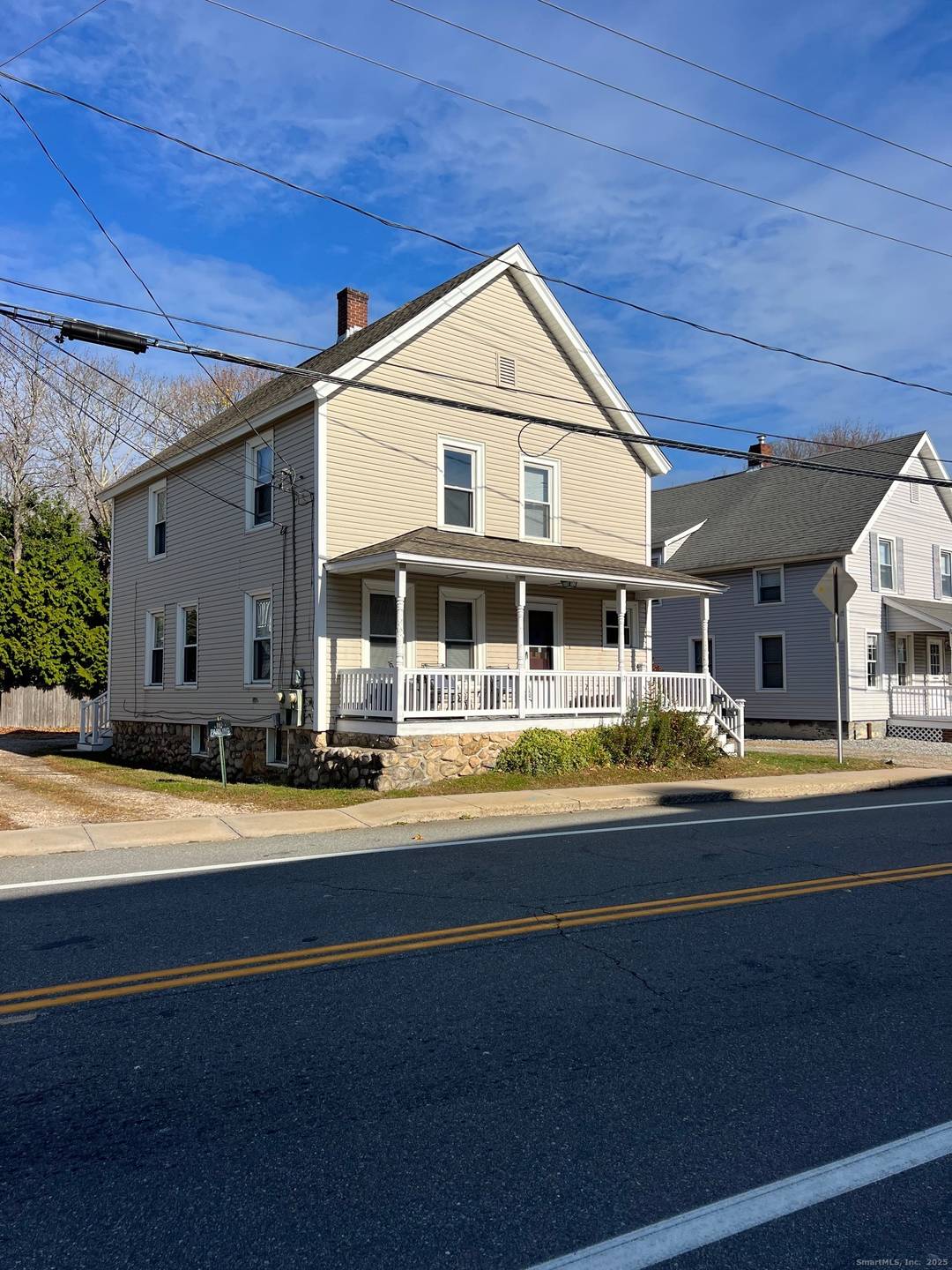 Great location for this 2 family home located just up from the Mystic train station.