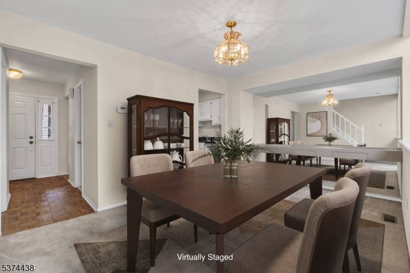 Welcome home to this spacious Quailbrook townhome, where comfort and style meet !