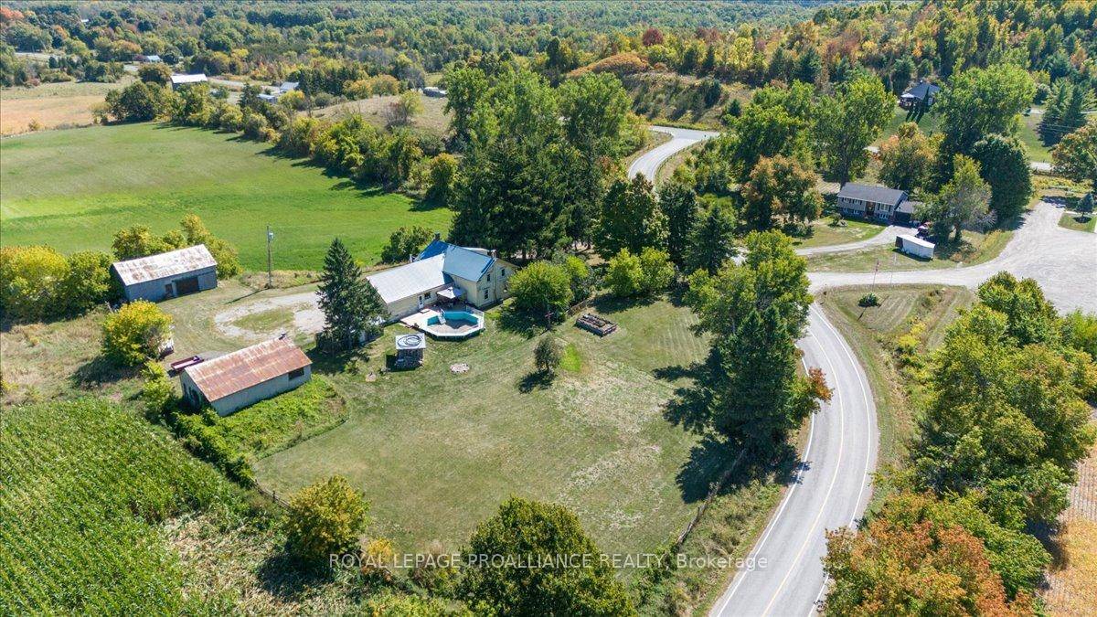 Step back in time with this classic two story farmhouse, built in 1834, set on a private 1.