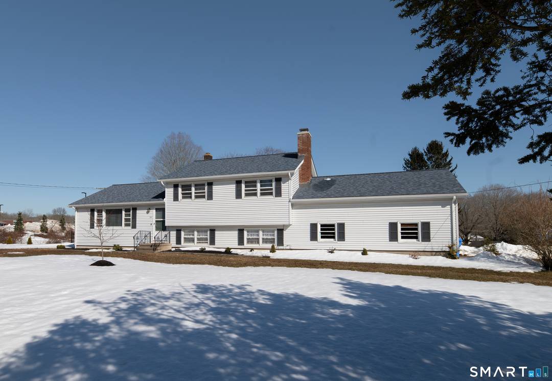 Located in beautiful Madison, CT, this classic split level home offers great potential and a fantastic opportunity to make it your own.