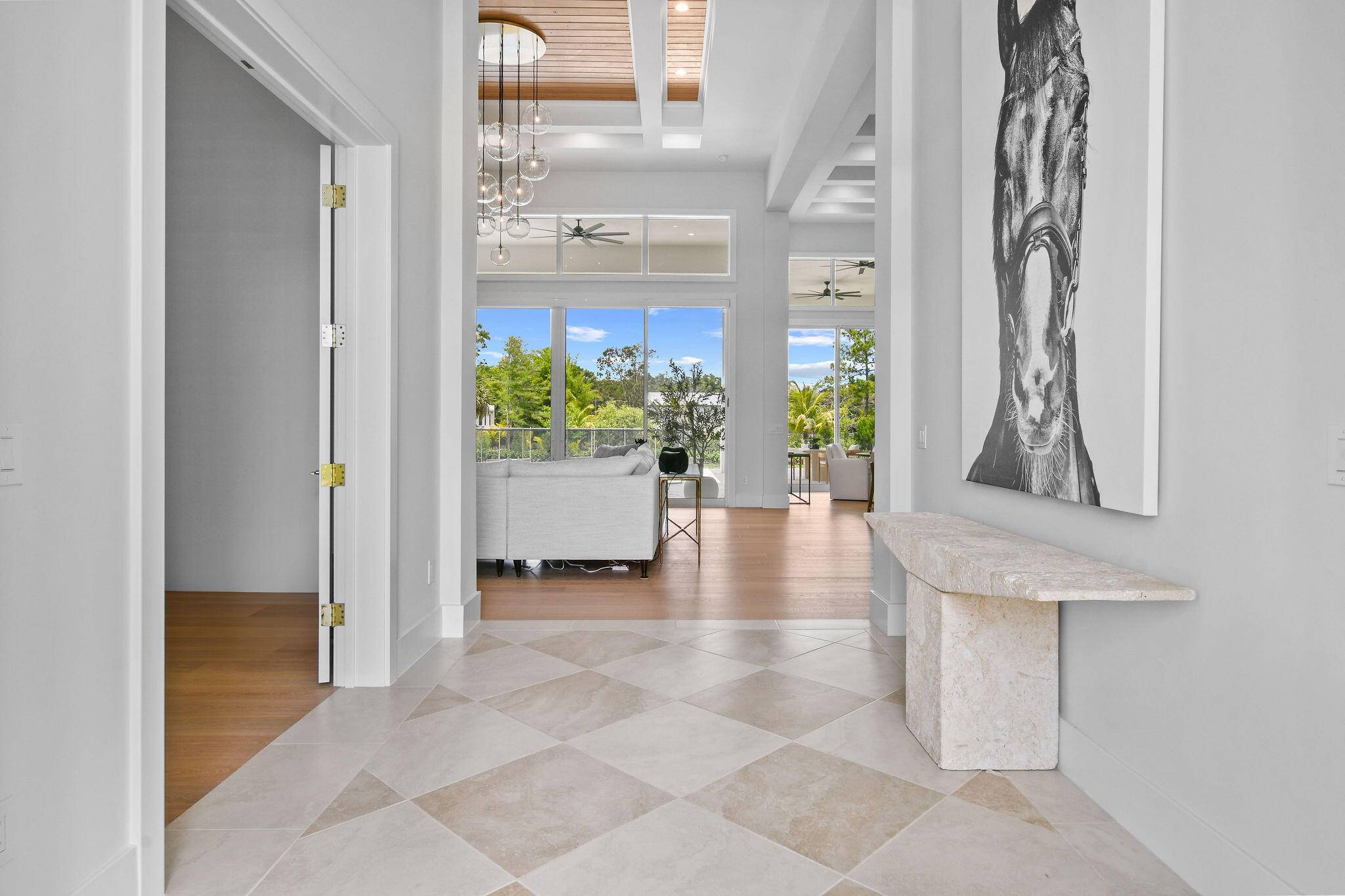 This brand new, designer furnished home is ready for immediate enjoyment in one of Jupiter Farms' most desirable locations.
