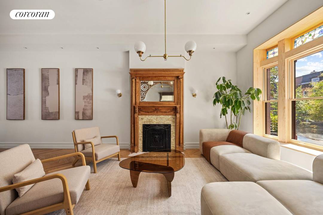 At 383 MacDonough Street, a fully renovated five bedroom, four full bath, two half bath beauty commands attention on one of Bedford Stuyvesant's most iconic tree lined, landmarked blocks.