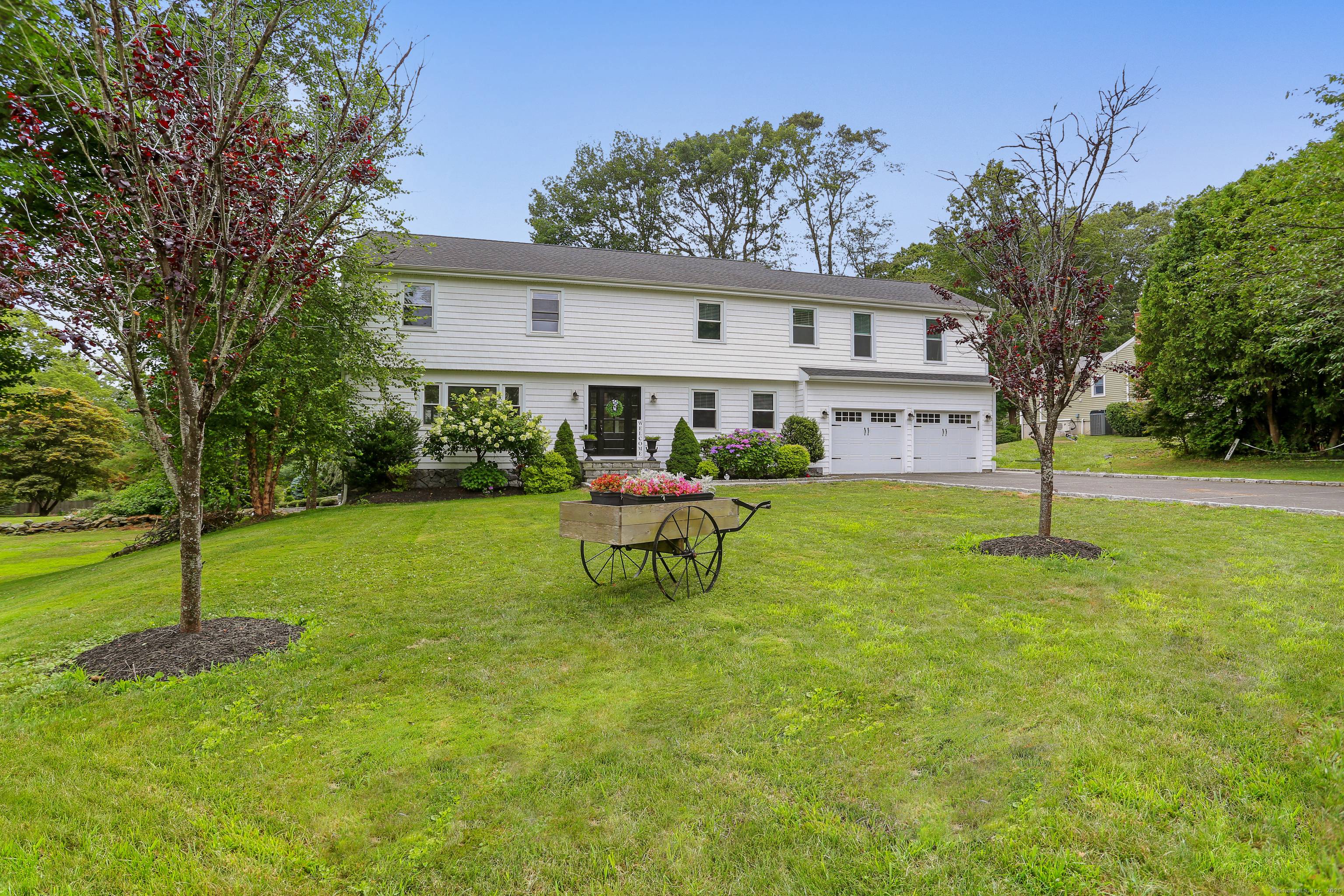Beautifully updated colonial with luxury finishes and exceptional outdoor Space.