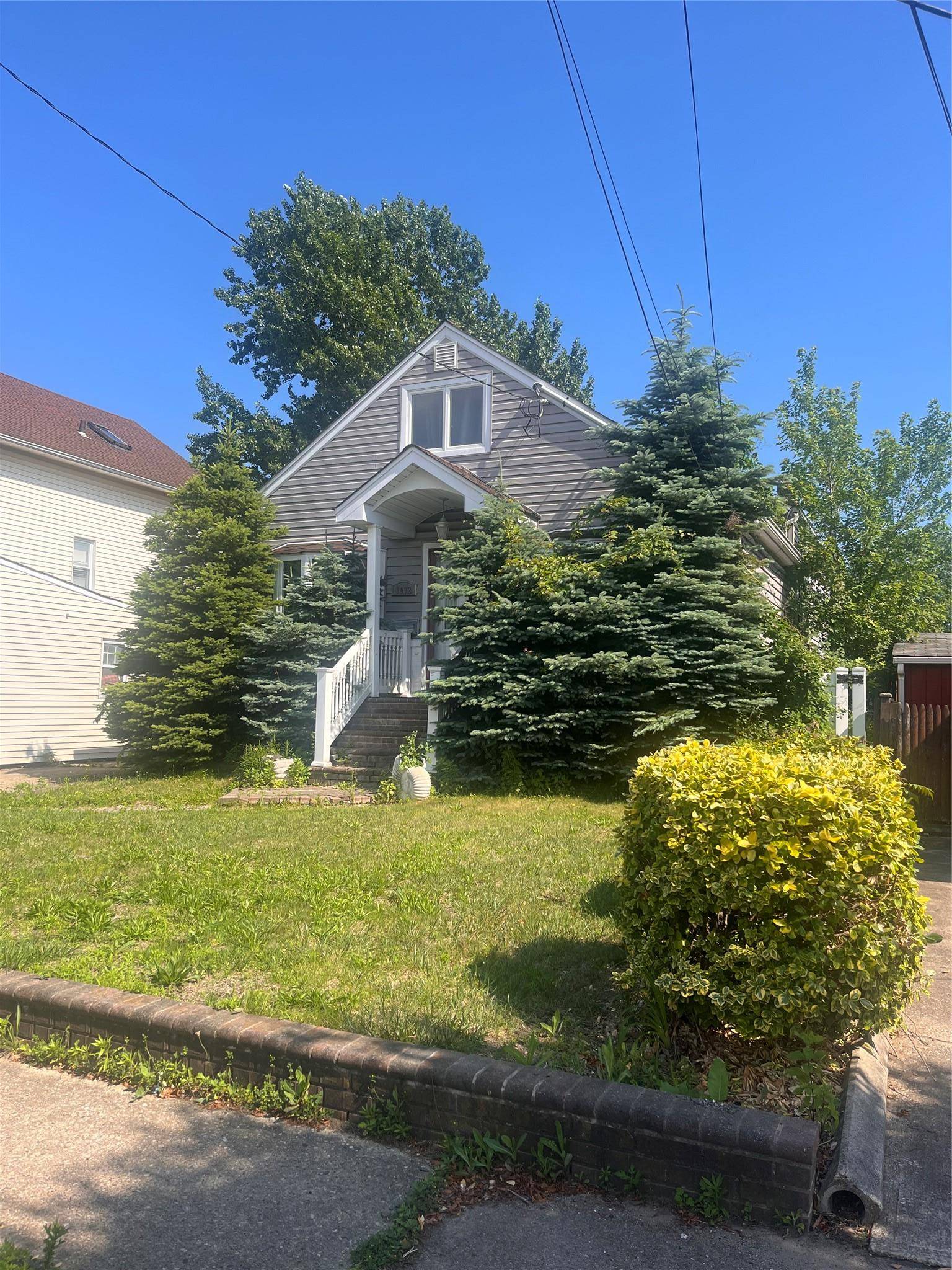 Charming Split Level located in Baldwin Harbor featuring three bedrooms and one and a half baths.