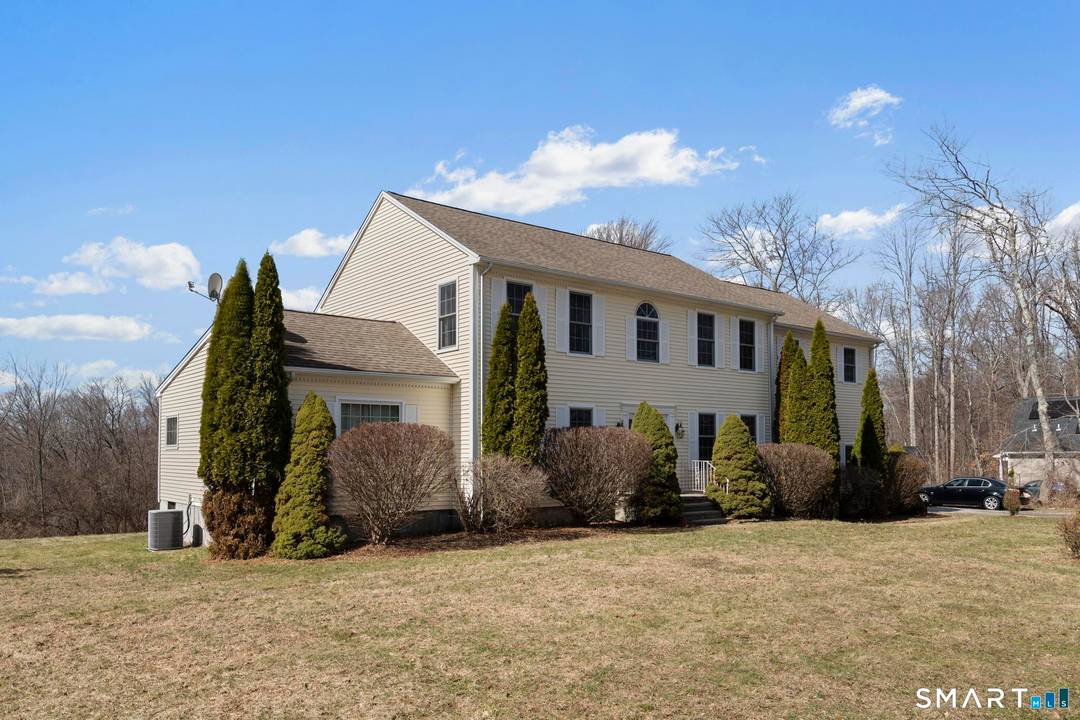 Welcome to this spacious and beautifully maintained home in desirable Oxford, CT.