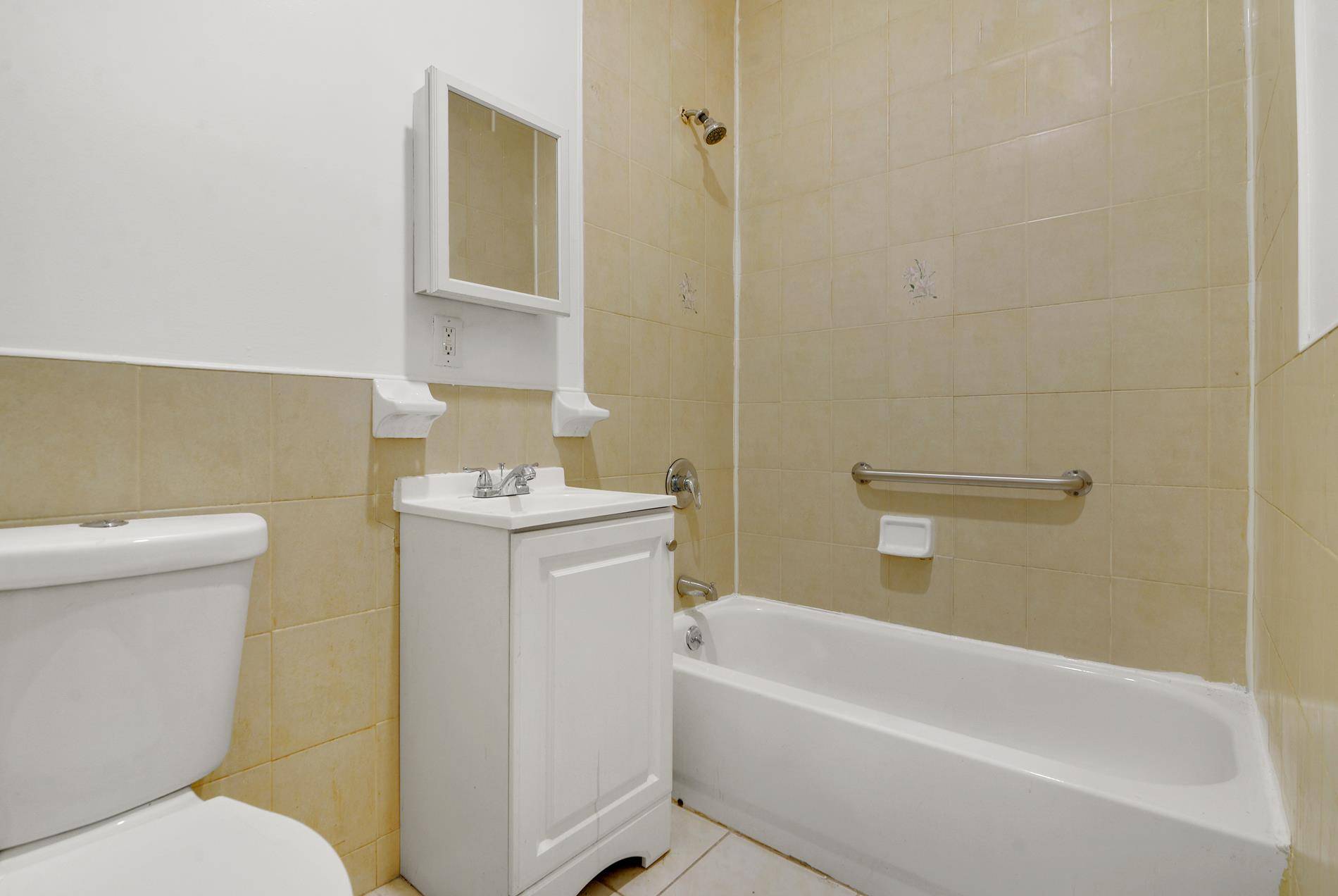 Rare Opportunity to own this full 3 Bedroom 2 bath Condo Apartment on the first Floor of this building.