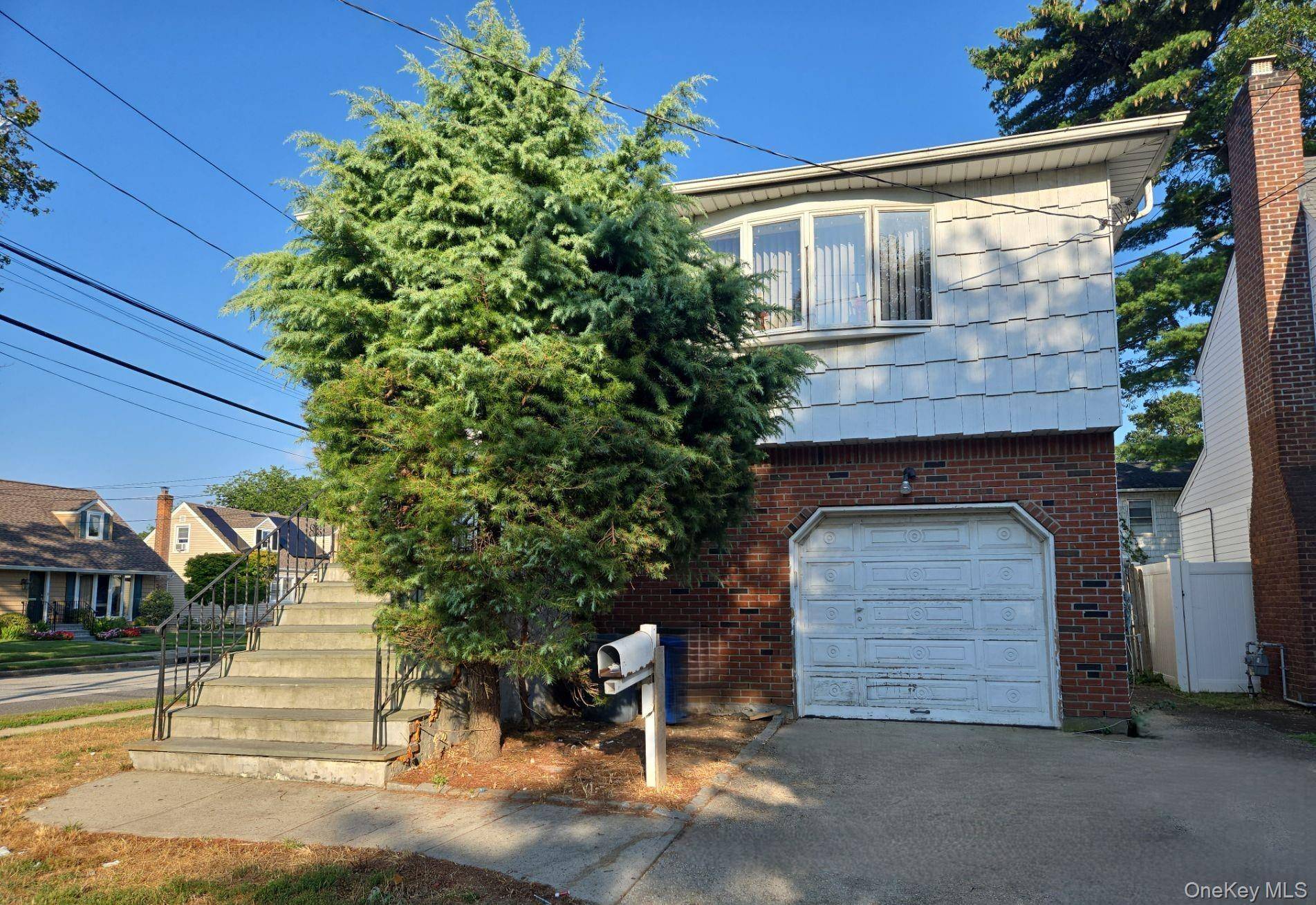 Large and spacious hi ranch style home situated on a corner parcel, having exceptional potential and being beautifully positioned for ease of access to stores, eateries, parks, and other area ...