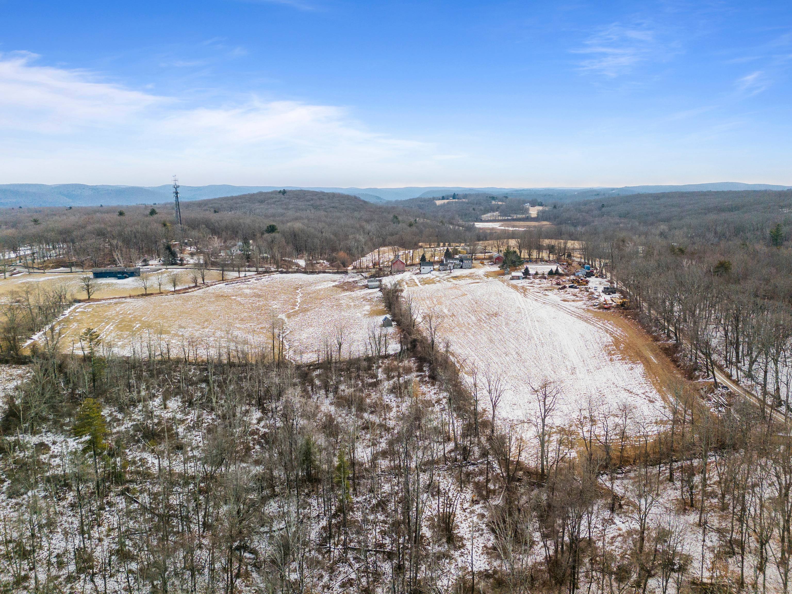 Great opportunity to own this expansive New England farm horse property situated on 70 acres with great views of the CT Litchfield Hills !