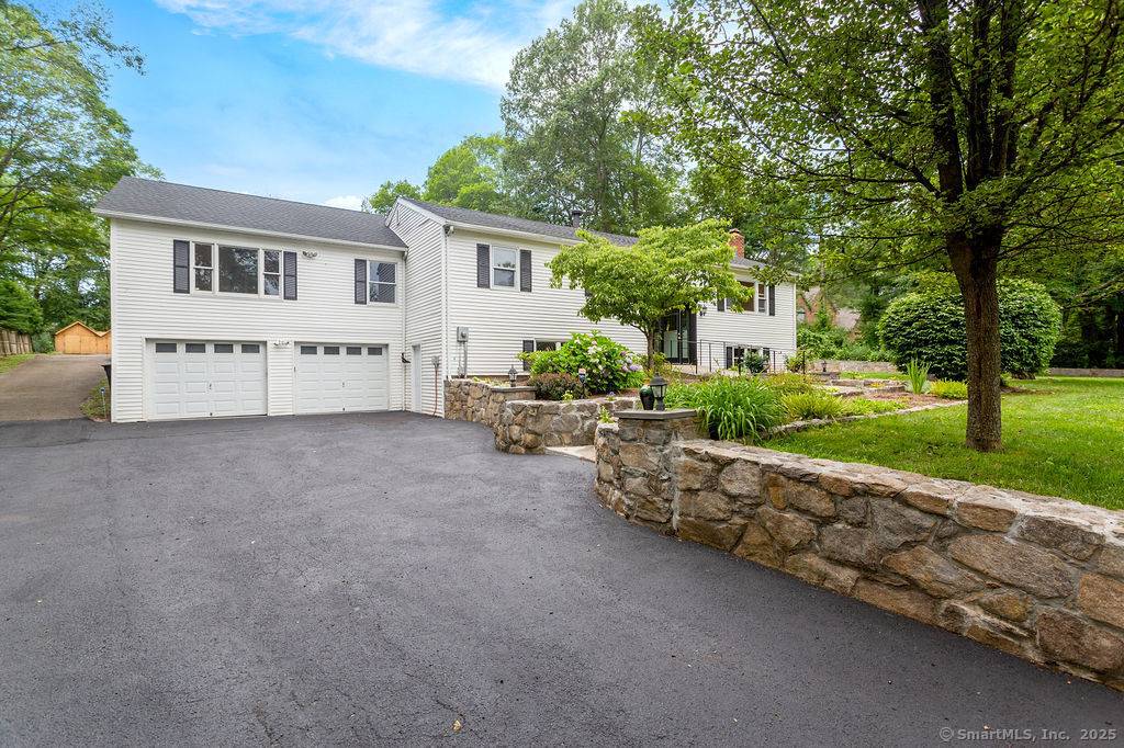 This oversized 5 bedroom, 3 full, 2 half bath home is situated on a quiet cul de sac with a level backyard.