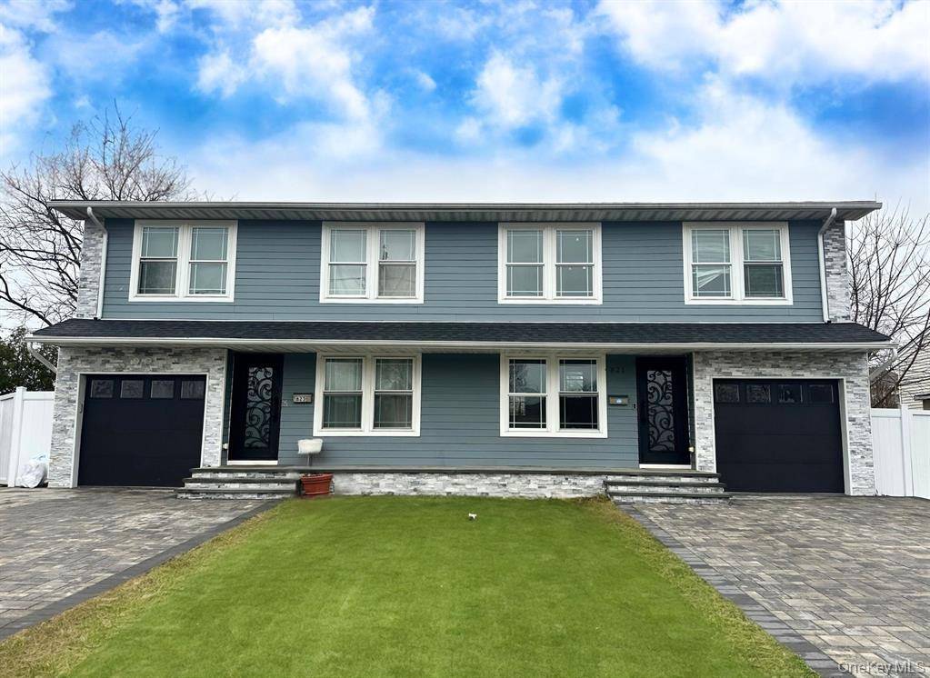 Beautiful Rental 3BR, 2Bath Duplex with backyard, 1 Car Garage, Private Driveway, Basement with Washer Dryer and Storage.