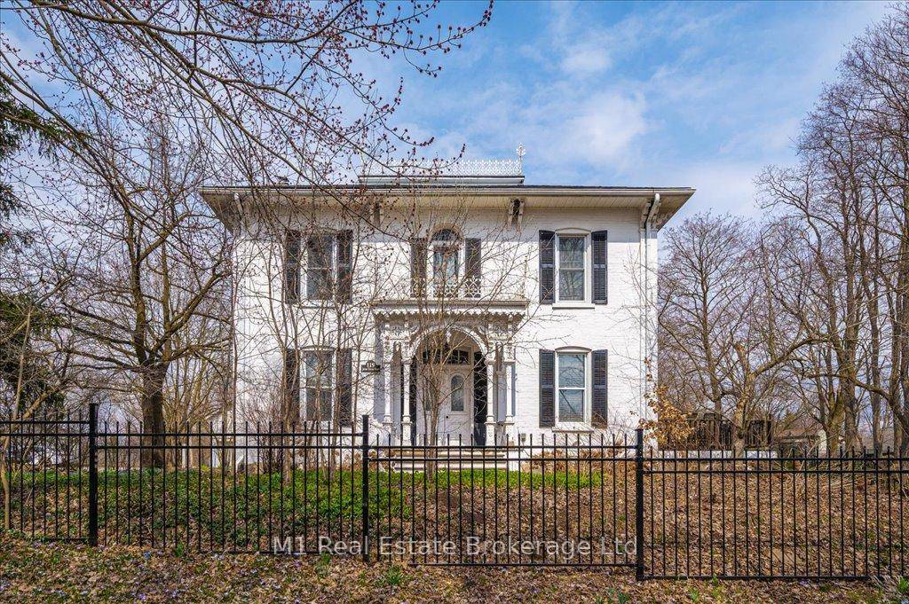 One of Winghams original estate homes, this impressive 5 bedroom, 3 bathroom century home sits on a large, tree lined lot in the heart of town.