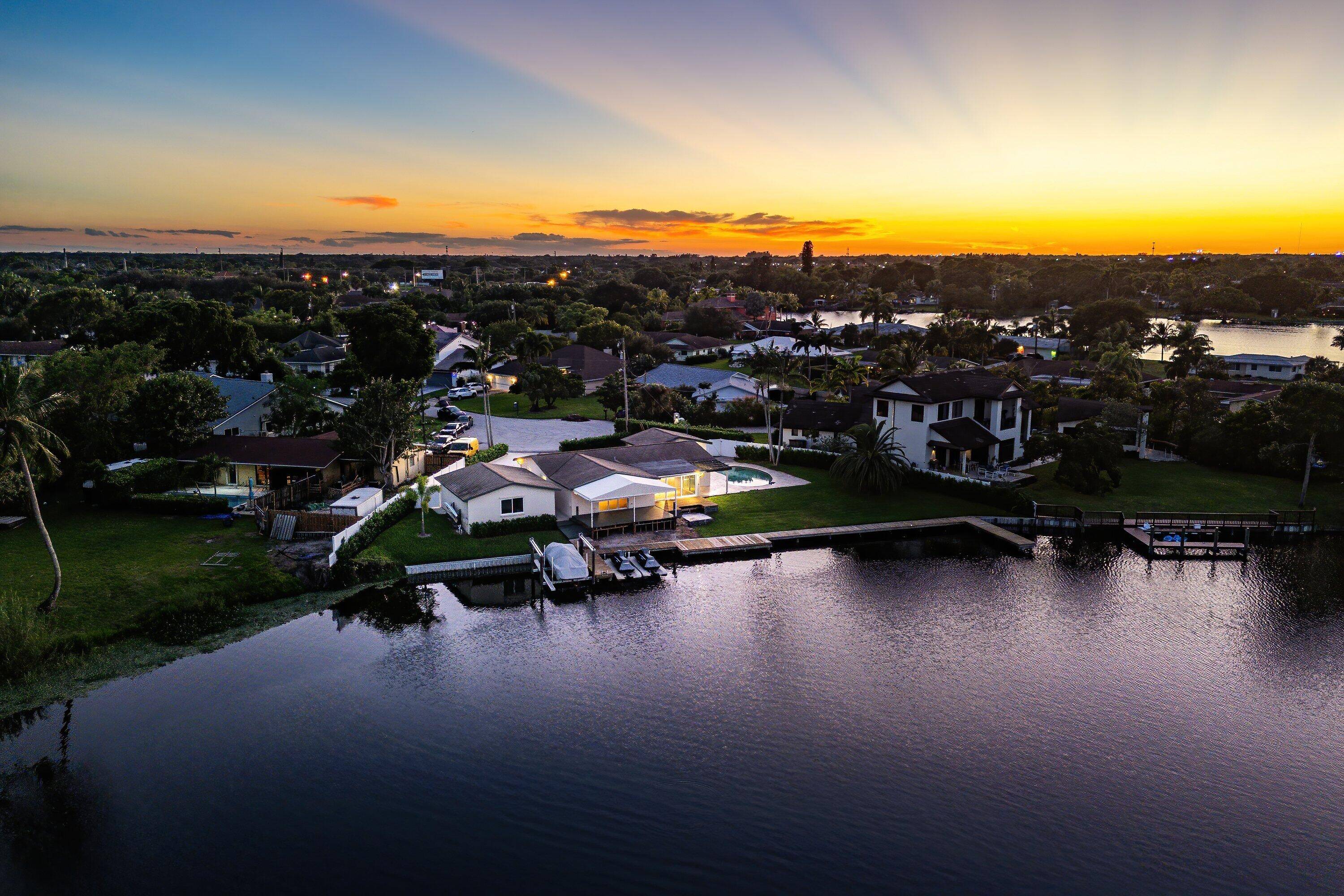 Tropical Paradise on Lake Osborne Your Dream Home Awaits !