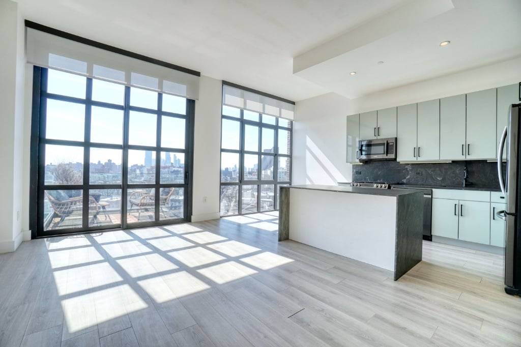 Manhattan skyline views, a private balcony, and nearly 929 sq ft of bright living space make this stunning 1 bedroom home at The Candle Factory truly stand out.