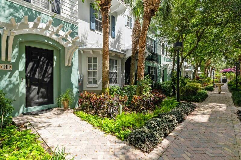 Rarely available courtyard townhome in Mallory Square.