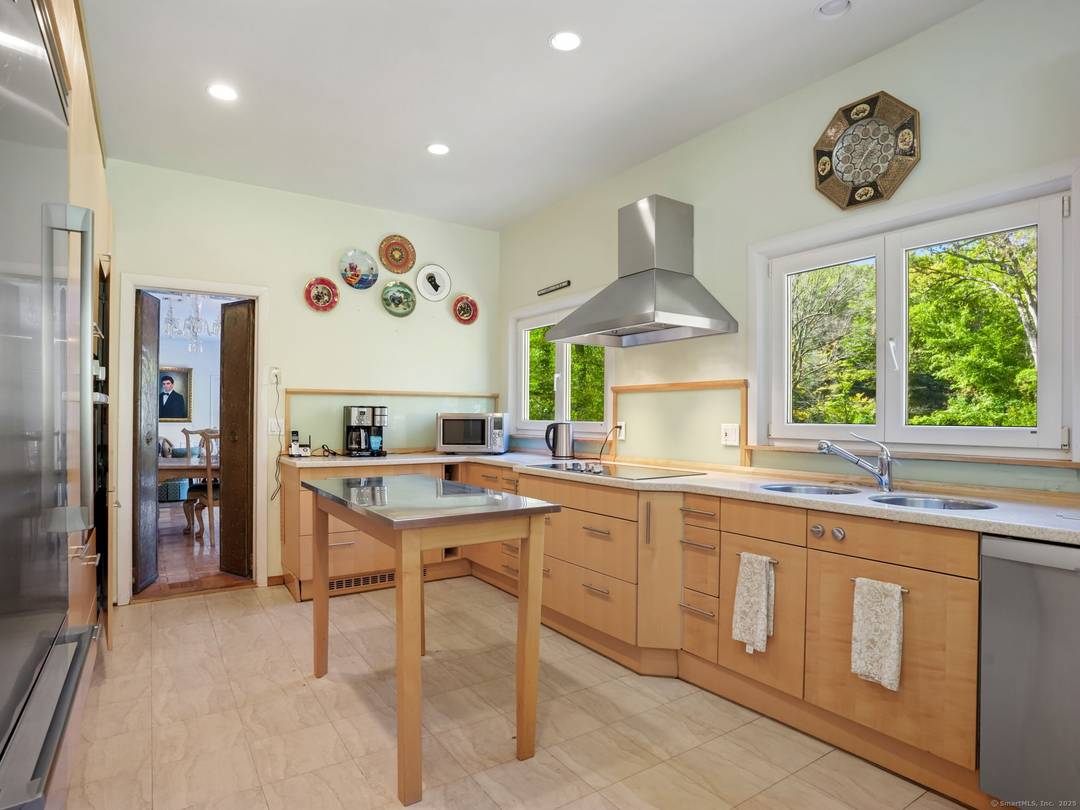 Nestled in a tranquil setting on a private road, this expansive 2402 sq ft 4 bedroom, 3 3 full bathroom home with a 2 car garage and a full attic ...