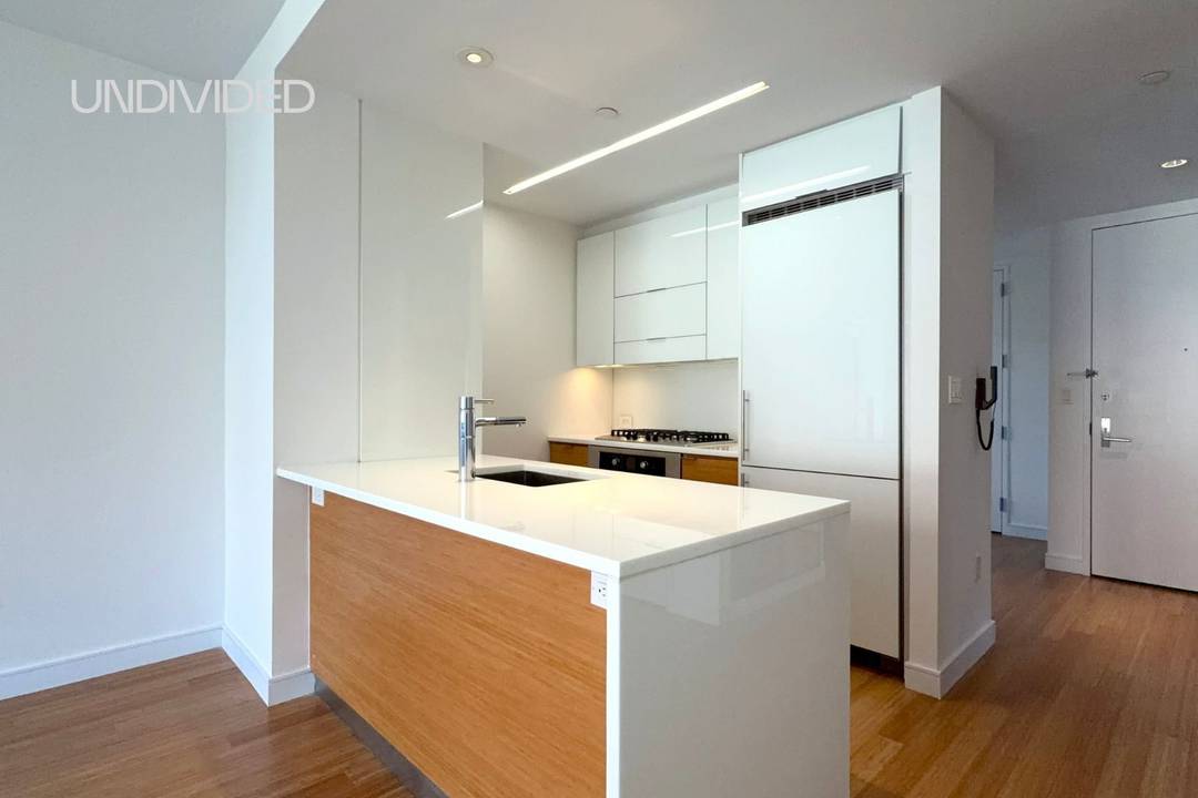 Residence 6F at 303 East 33rd Street offers approximately 874 square feet of modern, corner living with bright, north and east exposures.