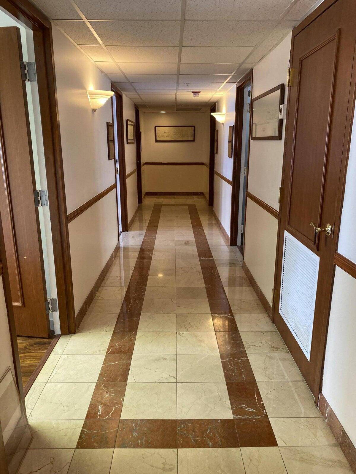 Spacious Office Suite with 5 Private Offices Ideal for Growing Teams.