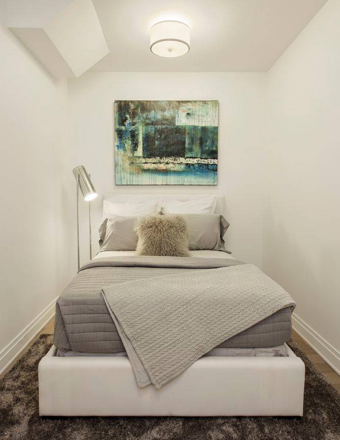Unique studio with a private balcony, in unit washer dryer, and multiple closets.