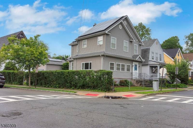 This expanded colonial home offers three bedrooms and a welcoming first floor entrance, starting with a heated porch area.