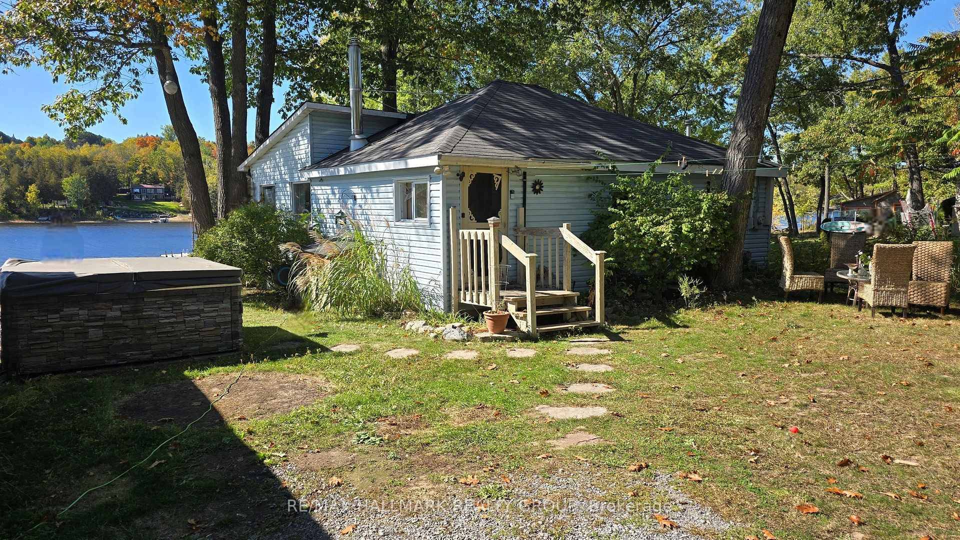 Waterfront ! All year round older 2 Bedroom Bungalow on a picturesque 72' x 168' lot on Buckhams Bay Ottawa River with detached 23' x 17' approx.