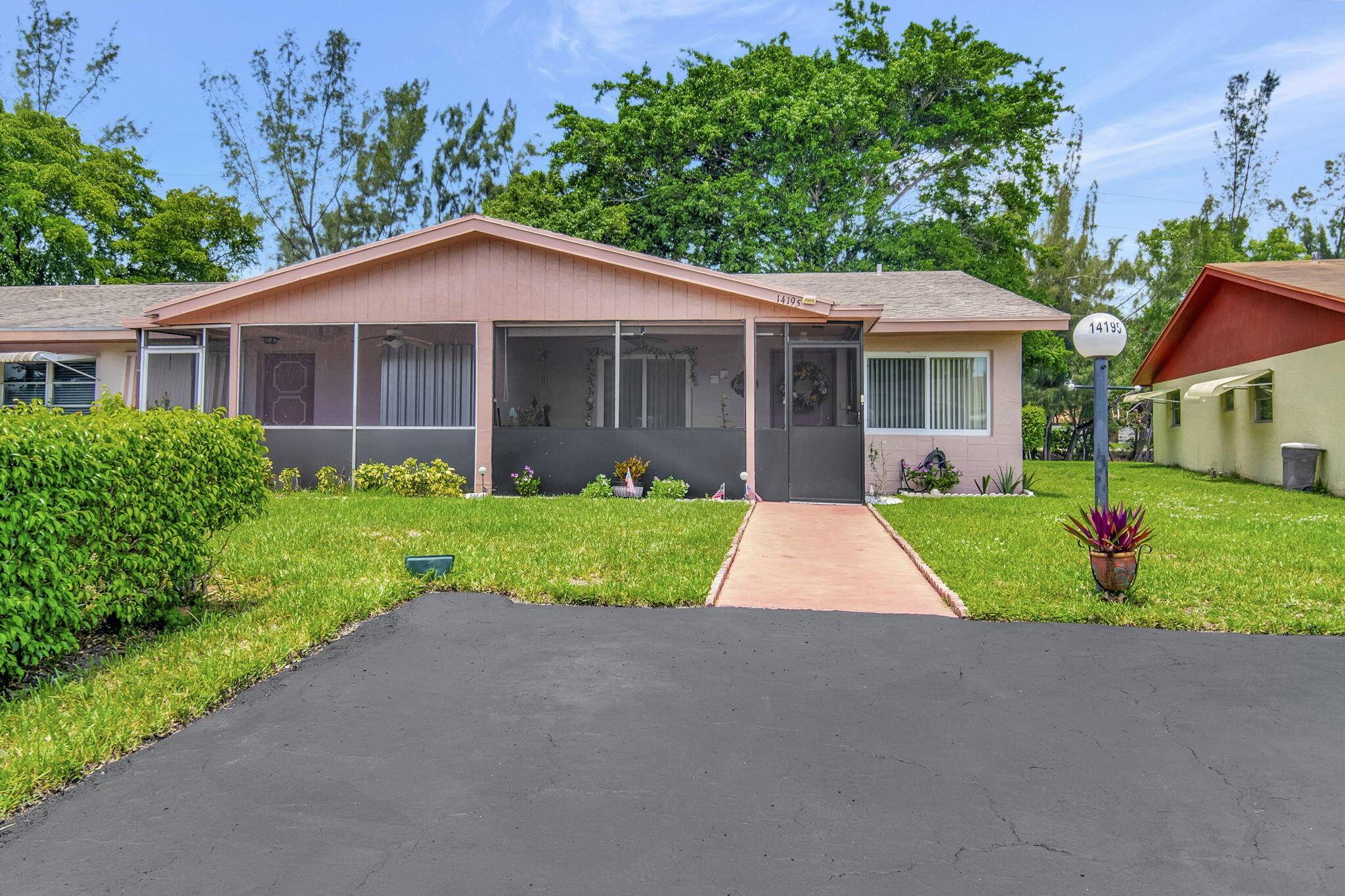 Comfort and convenience in this desirable 55 Delray Villa Plat 1 beautifully maintained on a waterfront corner lot.