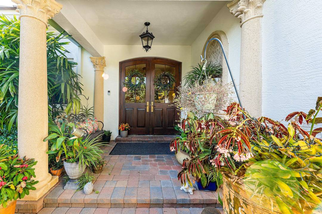 Nestled in the highly sought after Loxahatchee Club, this beautifully maintained single story home exudes timeless style and elegance.