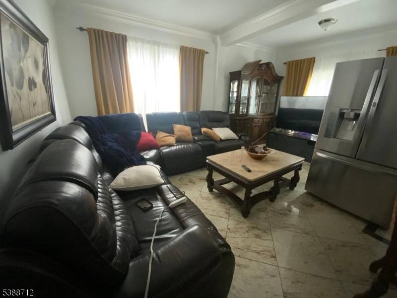 2 Apartments. Apartment 1, 2 bedrooms, living room, eat in kitchen and bath owner occupied.