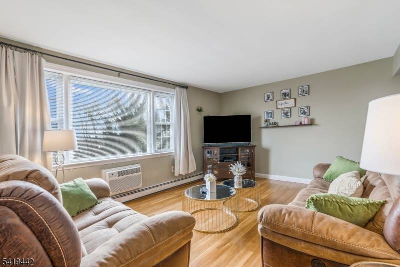 Welcome to this stunning newly renovated one bedroom corner condo in the sought after Montclair Heights section of Clifton.