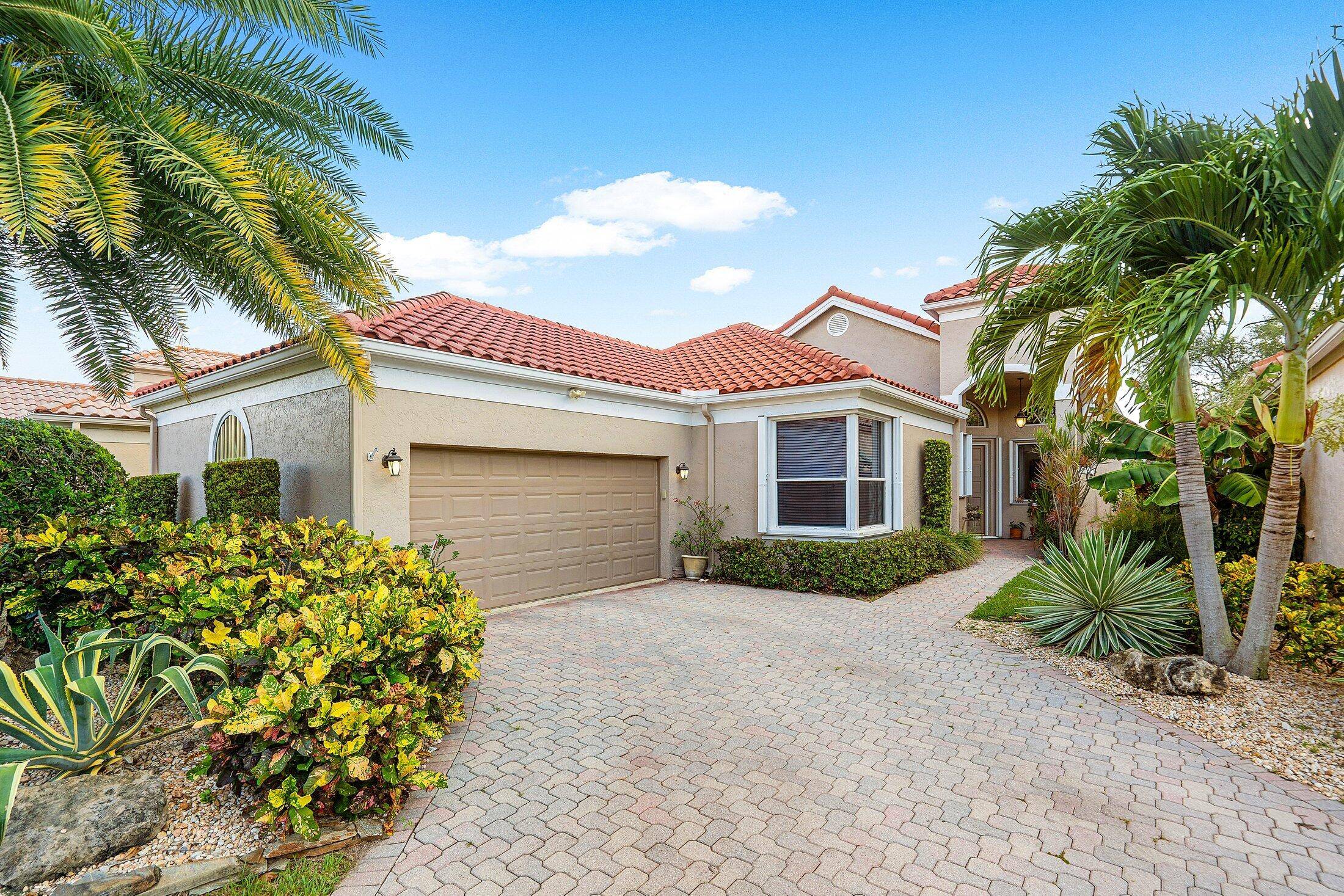 Enjoy stunning golf course lake views from this 3BR, 21 2BA home in a prestigious gated community.