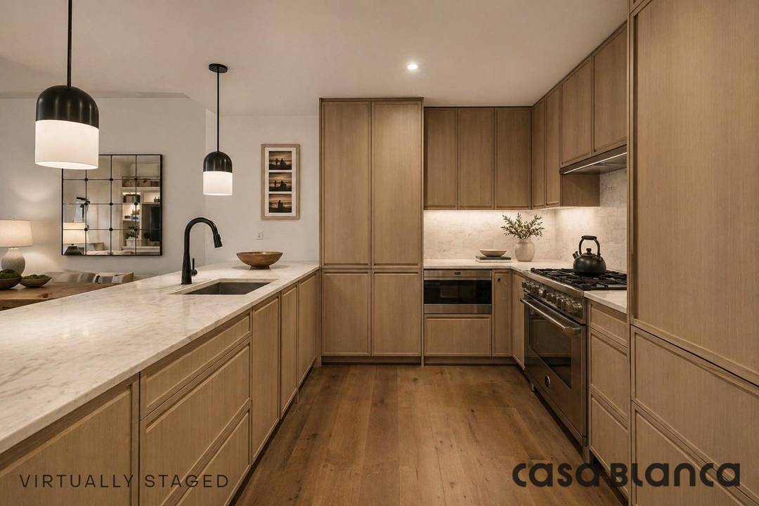 Residence 2B offers a rare opportunity to experience townhouse style indoor outdoor living all on a single level within the ease of a full service building.