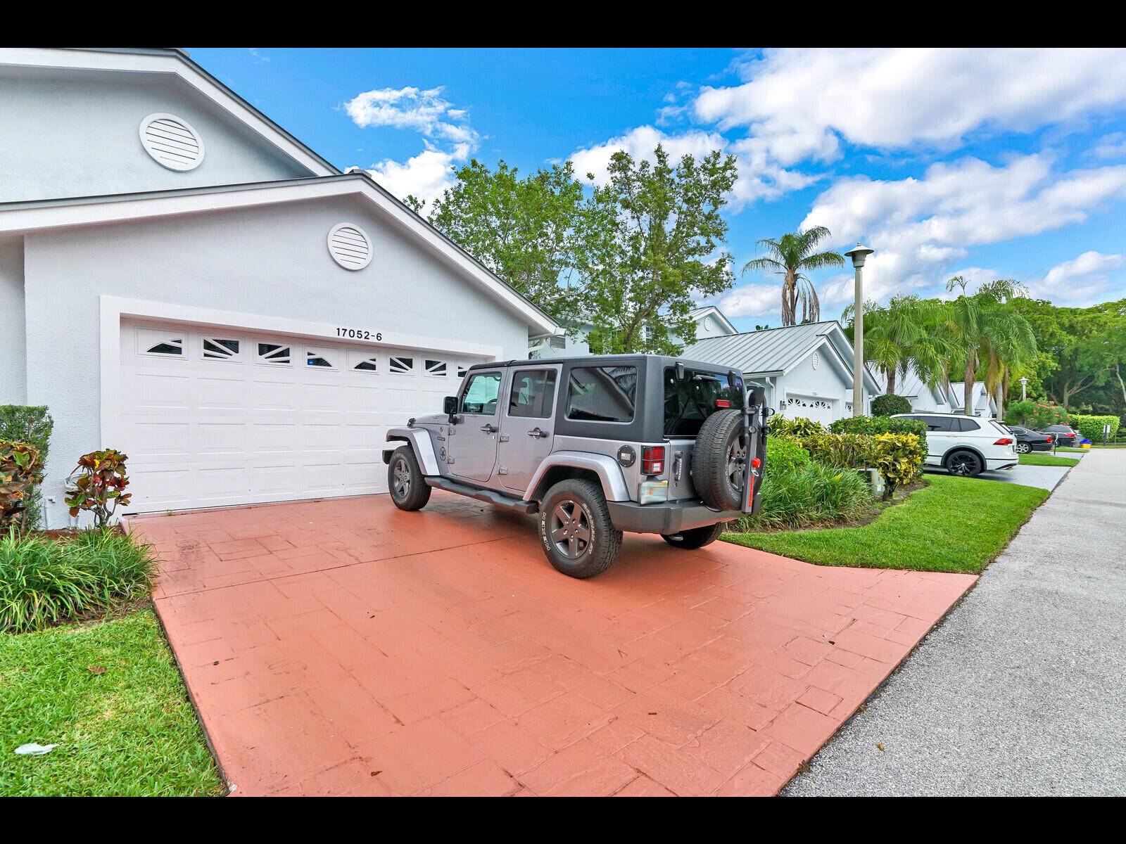 Welcome to your dream home in the heart of the desirable Boca Country Club !