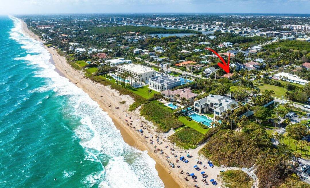 Elegant coastal retreat in exclusive Ocean Ridge, just steps from the Atlantic Ocean.