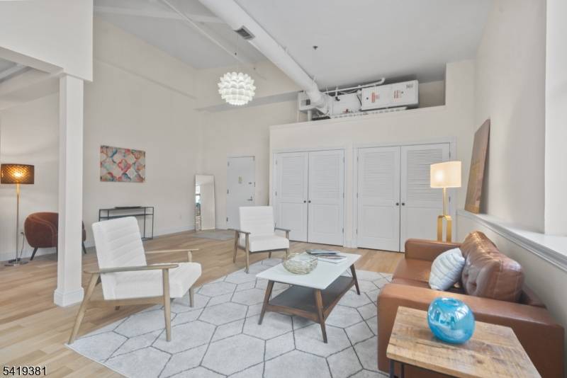 Dramatic and expansive industrial DUPLEX condo at the Foundry Lofts.