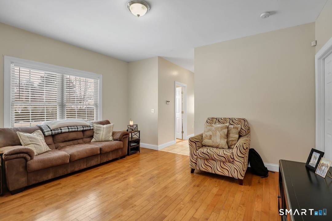 Welcome to a rare opportunity to own this half duplex just moments from the vibrant downtown area of Southington.