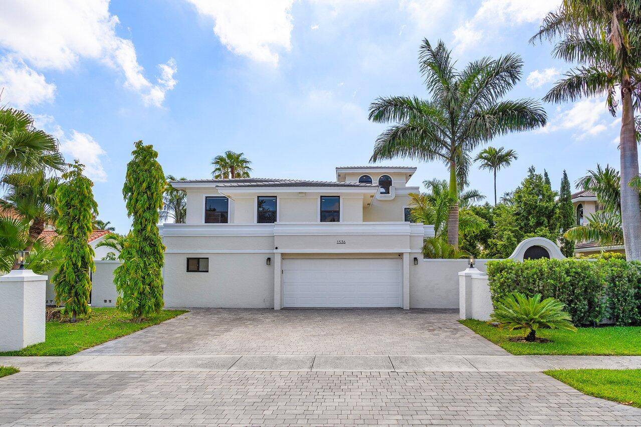 Enjoy Luxury Waterfront living in this Mediterranean Estate home in East Boca Raton.