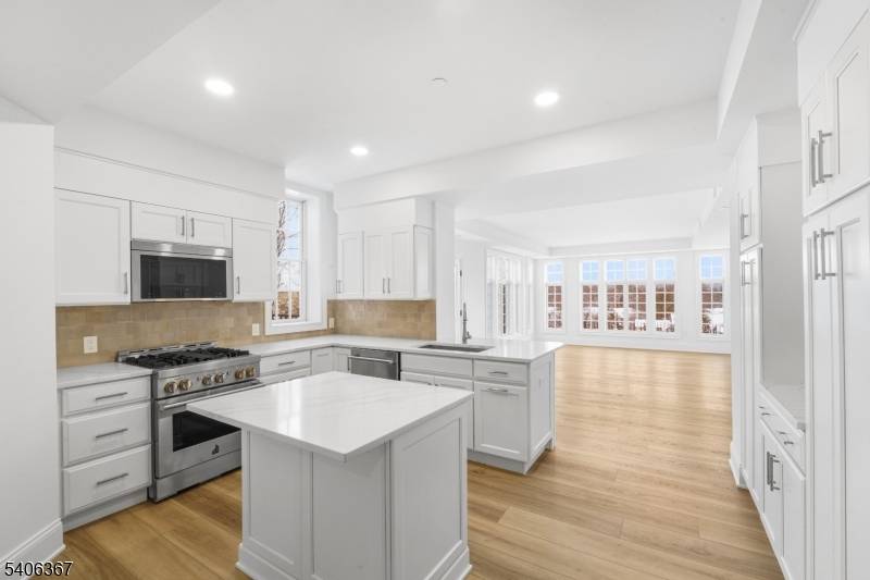 Newly constructed ground floor 2 bedroom, 1 1 2 bath condominium located within the renovated Averett Estate mansion at The Enclave at Chatham.