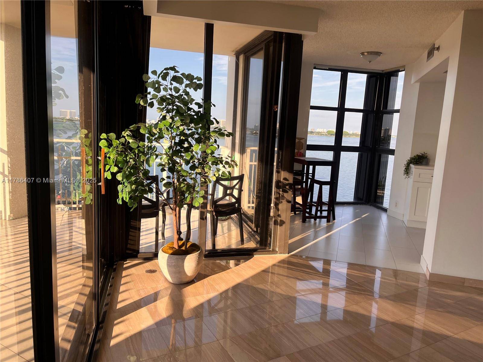 SPECTACULAR PANORAMIC VIEWS OF THE BAY, MARINA AND GARDENS, TWO BED, TWO BATH, RENOVED KITCHEN, WOOD AND TILE FLOOR, LARGE DINNING ROOM WITH BREAKFAST AREA, SUPER BRIGHT.