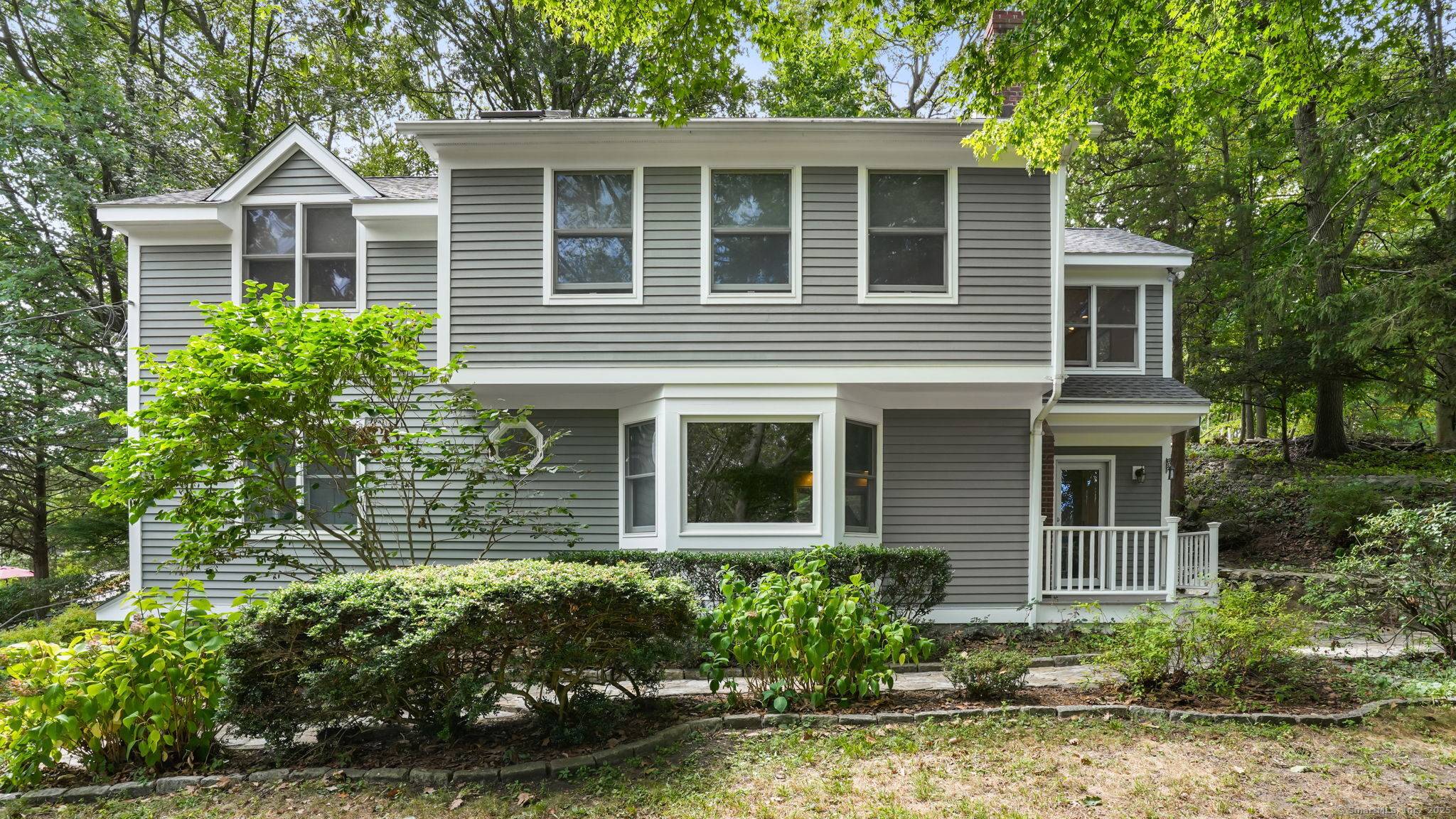 Welcome to 9 Trailside Drive, tucked away in Norwalk's sought after Wolfpit neighborhood.