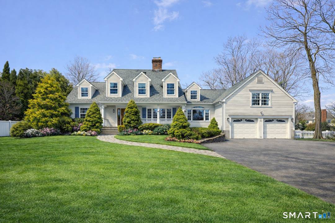 Storybook charm meets modern living in the heart of New Canaan !