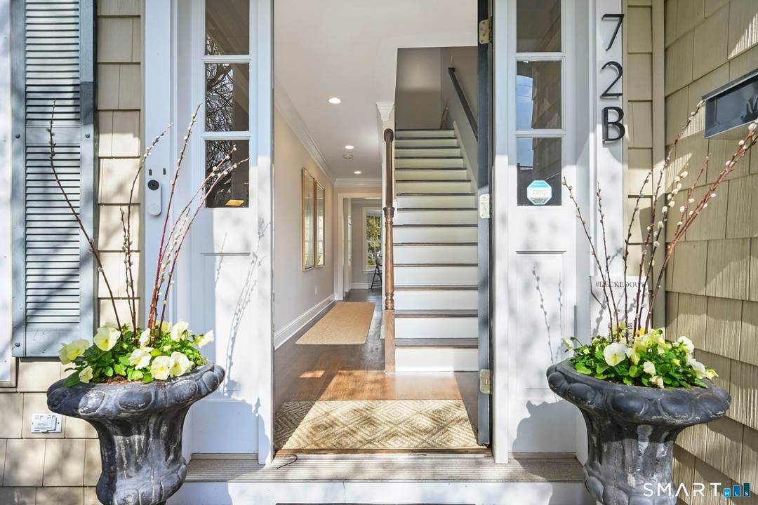 Beautifully updated and full of charm, this surprisingly spacious townhome offers the ease of in town living in one of New Canaan's most convenient locations.