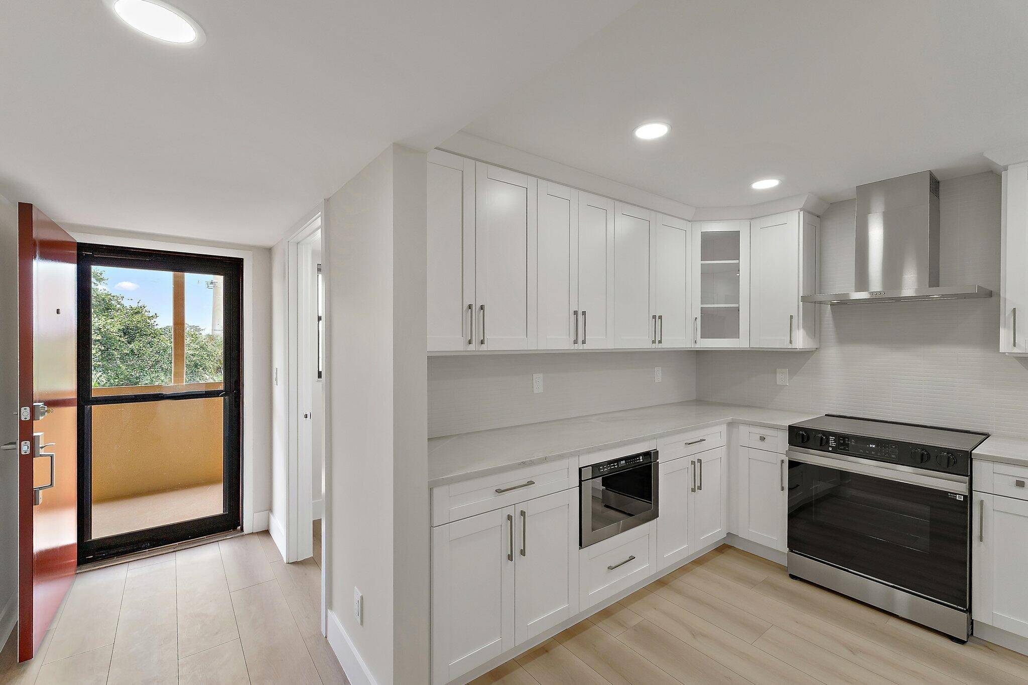 Reconstructed, turn key opportunity awaits by thoughtful design in this layout improved upon from the original floor plan, overlooking the North Palm Beach Marina and across the street from the ...