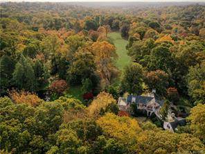 A 1938 Brick Georgian perfectly sited on a private natural preserve ; this 32 acre gated estate offers security, solitude and open space just one hour from New York City ...