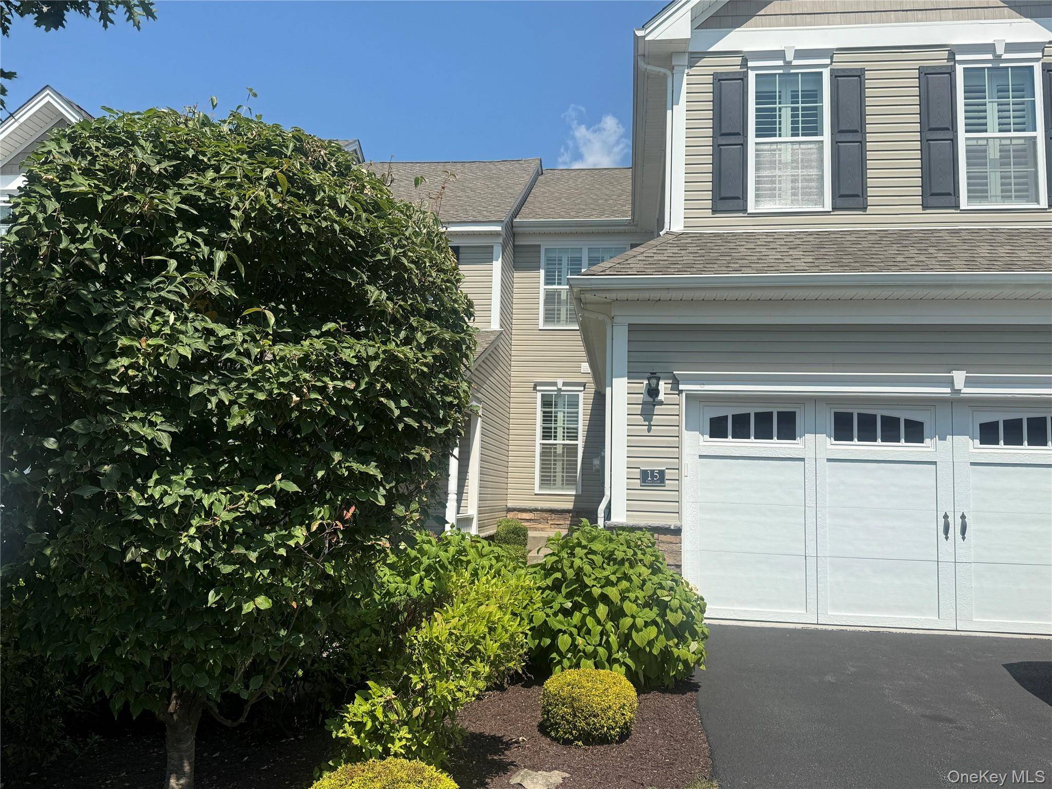 Welcome to your dream retreat in the heart of the Fishkill Woods community !