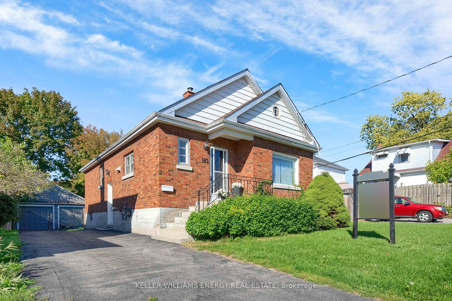 Welcome home to 182 Stacey Avenue, a quaint brick bungalow that effortlessly combines modern upgrades with timeless appeal.