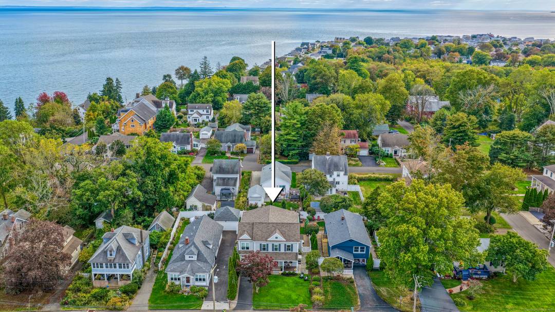Wake up to sea breezes from Long Island Sound in this beautifully rebuilt 4 bedroom, 2.