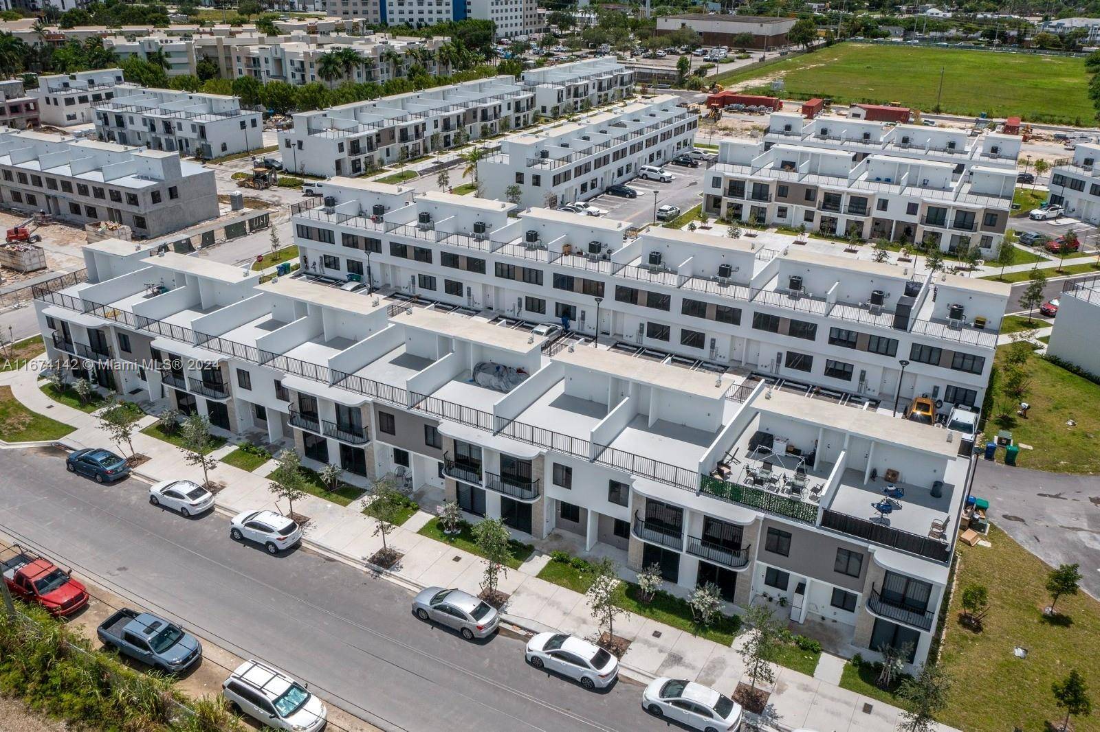 Grandville Townhouses New Home Construction Collection X Taupe Facade and Color Scheme with impact windows.